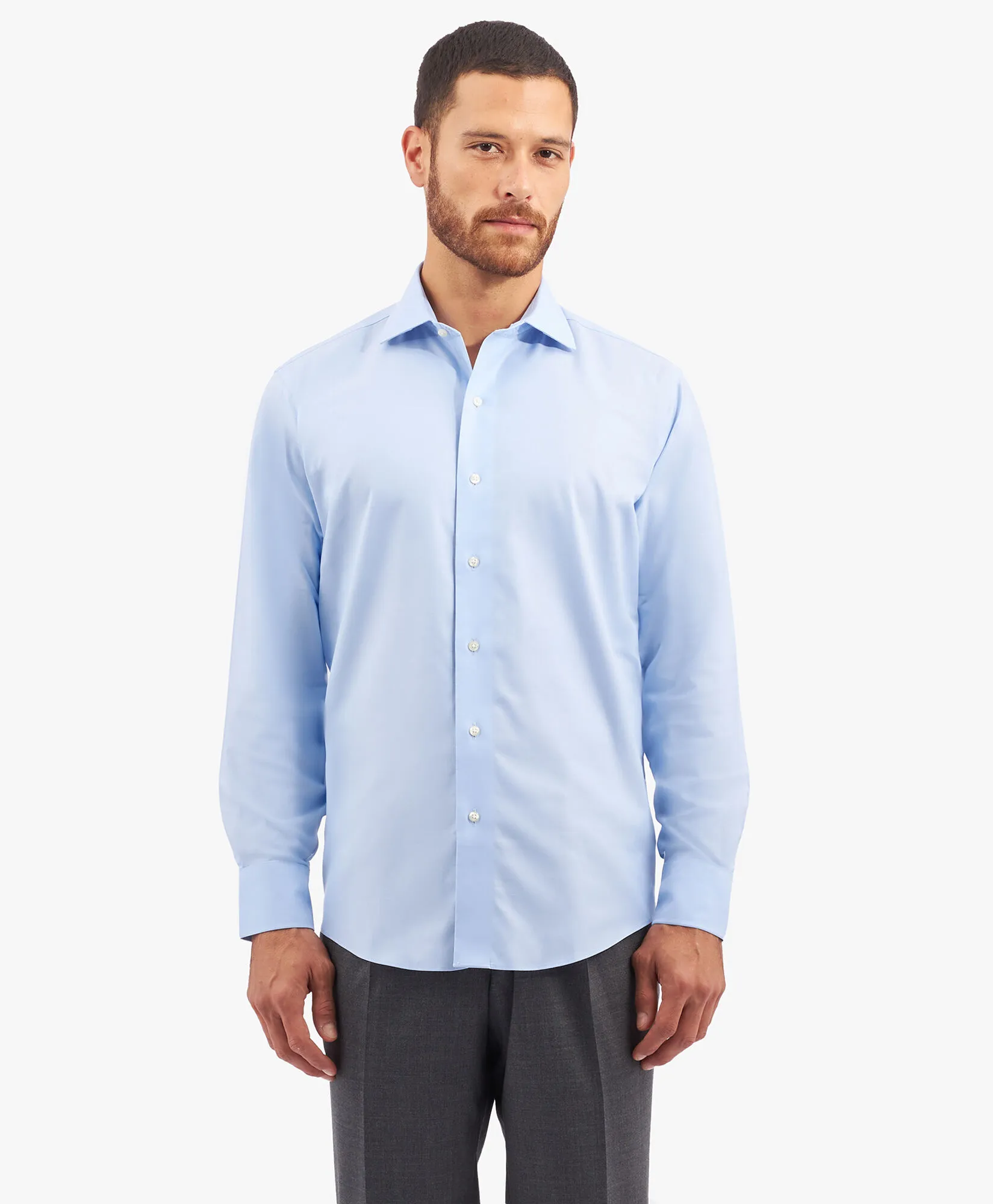 Camisa de algodón elástico azul pastel non-iron corte regular con cuello inglés abierto