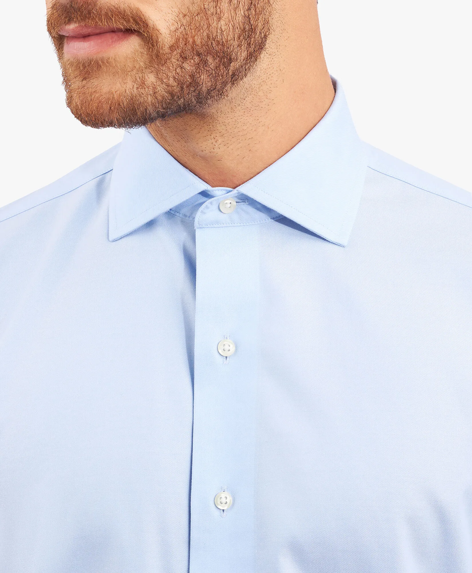 Camisa de algodón elástico azul pastel non-iron corte regular con cuello inglés abierto