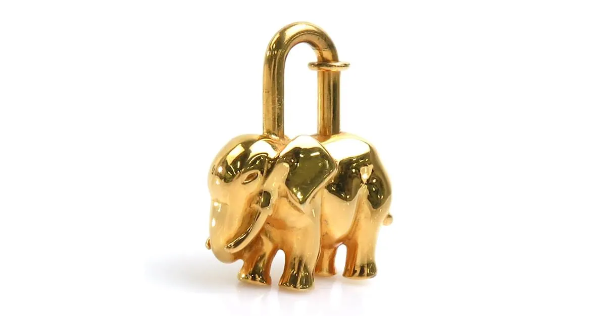 Otras joyas Candado de metal dorado de Hermès con motivo de elefante 