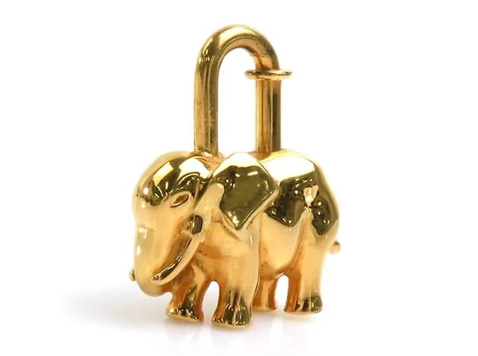 Otras joyas Candado de metal dorado de Hermès con motivo de elefante 