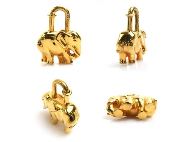 Otras joyas Candado de metal dorado de Hermès con motivo de elefante 